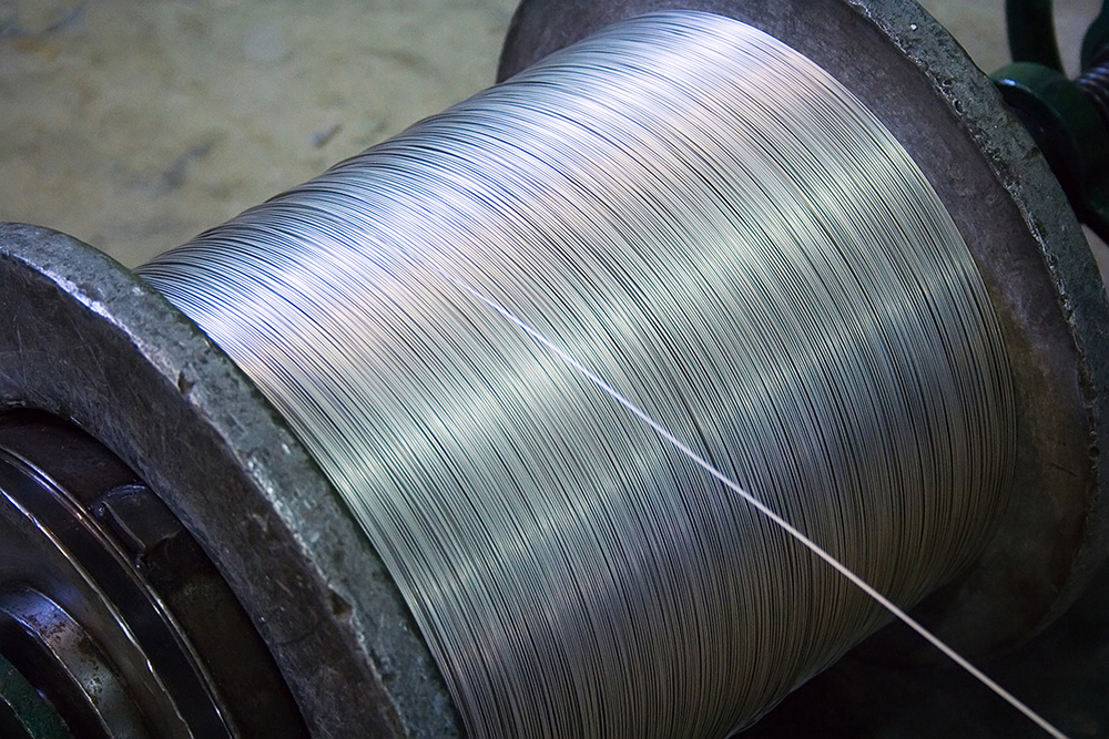 Steel wire on a reel at manufacturing.